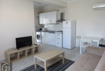 URLA MERKEZ GÜVENLİKLİ OTOPARKLI SİTEDE 1+1 EŞYALI KİRALIK DAİRE