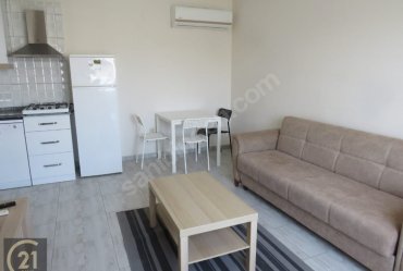 URLA MERKEZ GÜVENLİKLİ OTOPARKLI SİTEDE 1+1 EŞYALI KİRALIK DAİRE