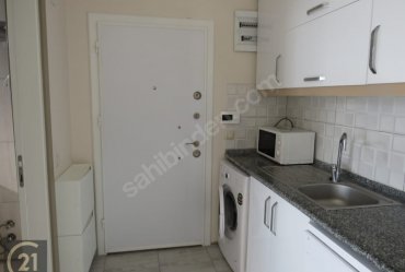 URLA MERKEZ GÜVENLİKLİ OTOPARKLI SİTEDE 1+1 EŞYALI KİRALIK DAİRE