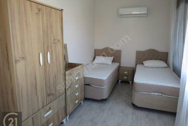 URLA MERKEZ GÜVENLİKLİ OTOPARKLI SİTEDE 1+1 EŞYALI KİRALIK DAİRE